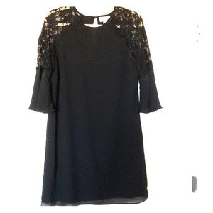 Black dress. Lace bell sleeve